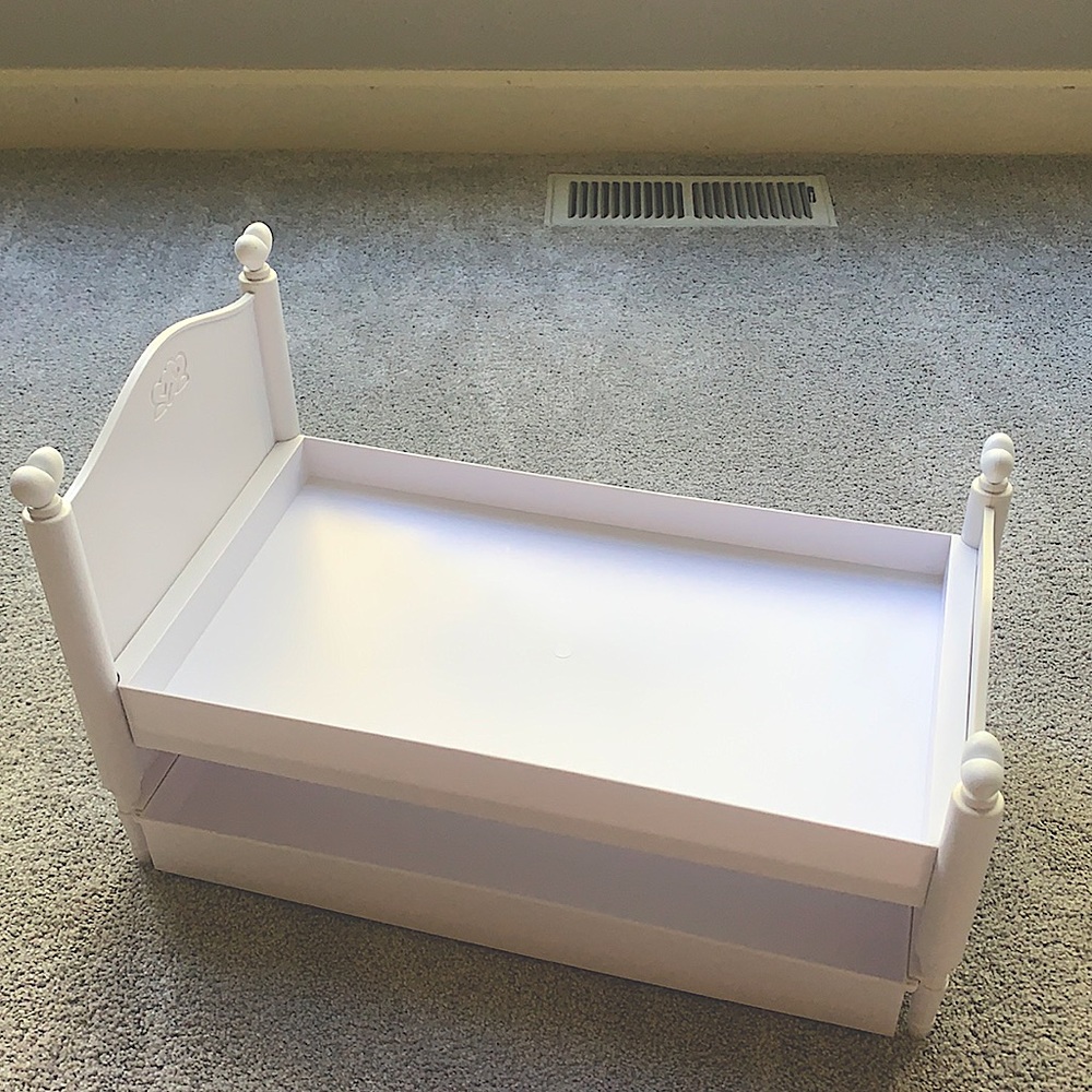 American girl doll bed set with two bed cushions.
